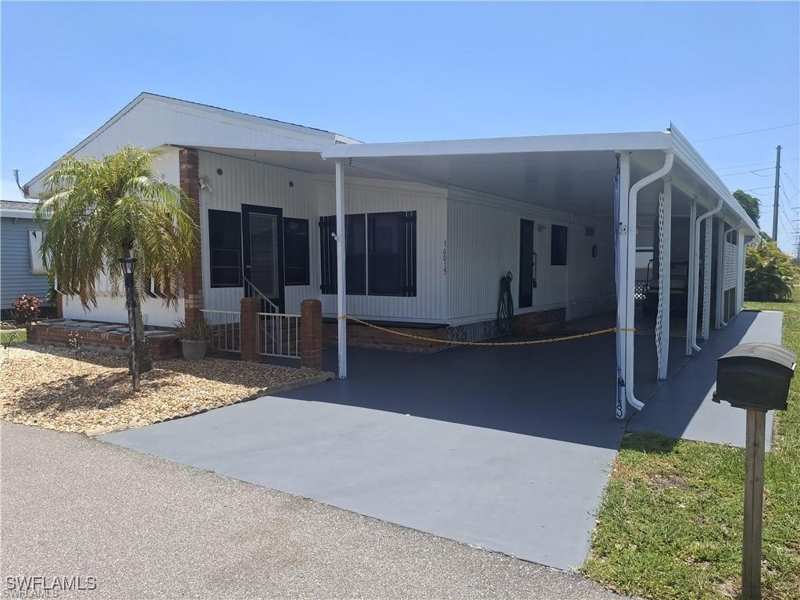 2 bedroom ManufacturedHome at 16015 Tangelo Way, Leesure Village, North Fort Myers — photo 1
