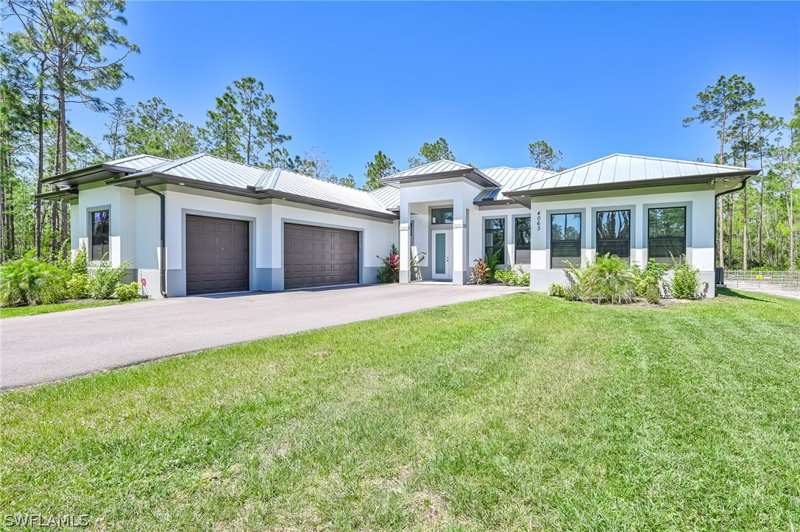 4 bedroom SingleFamilyResidence at 4063 8th Ave NE, Golden Gate Estates, Naples — photo 1