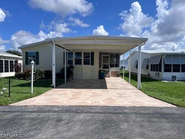 3 bedroom ManufacturedHome at 65 Turquoise Ave 65T, Enchanting Shores, Naples — photo 1