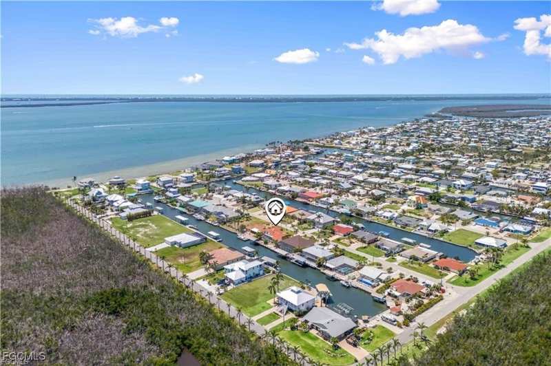 4 bedroom SingleFamilyResidence at 2420 Cherimoya Ln, Pine Island Shores Unit 9, St James City — photo 1