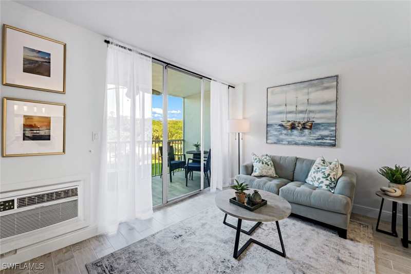 bedroom Condominium at 5 Bluebill Ave 205, Vanderbilt Towers, Naples — photo 1