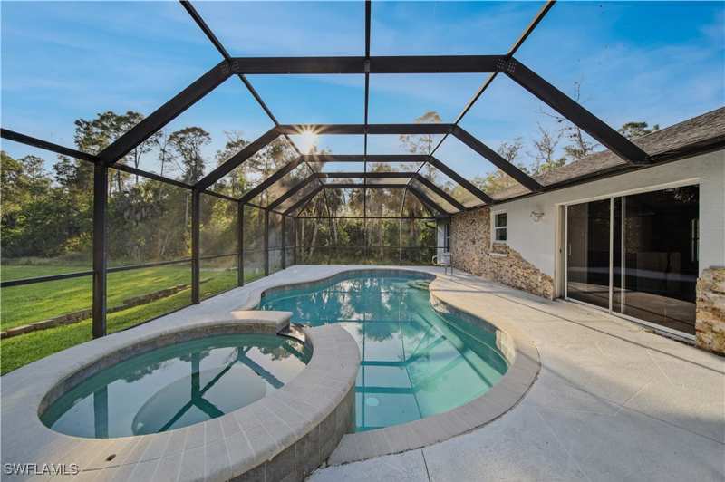 4 bedroom SingleFamilyResidence at 390 35th Ave NE, Golden Gate Estates, Naples — photo 1