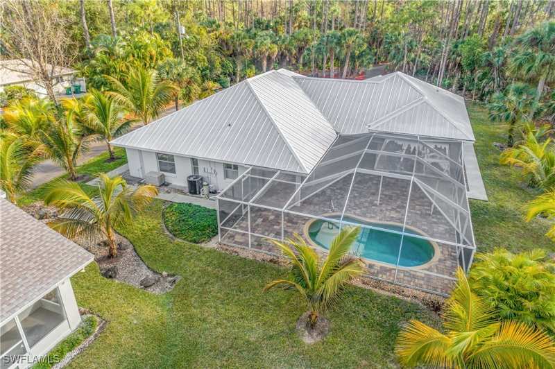 5 bedroom SingleFamilyResidence at 5099 Tallowood Way, Logan Woods, Naples — photo 1