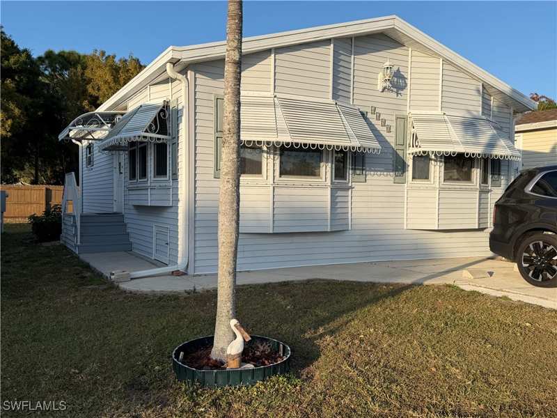 1 bedroom ManufacturedHome at 4680 Washington Way W, Riverwoods Plantation, Estero — photo 1