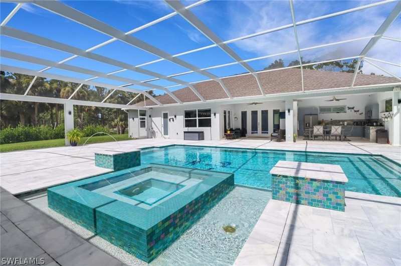 4 bedroom SingleFamilyResidence at 1086 21st St SW, Golden Gate Estates, Naples — photo 1