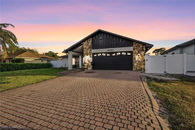 4 bedroom SingleFamilyResidence at 5050 32nd Ave SW, Golden Gate City, Naples — photo 1
