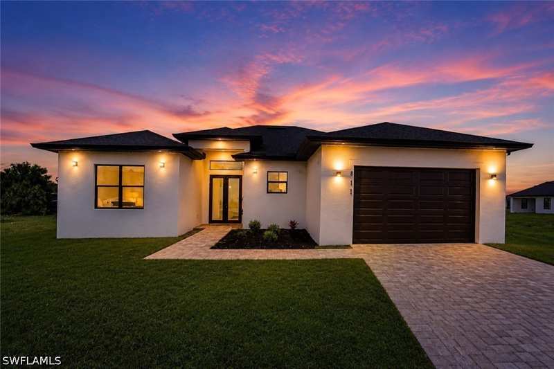 4 bedroom SingleFamilyResidence at 811 Dartmouth Ct, Mirror Lakes, Lehigh Acres — photo 1