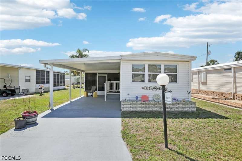 2 bedroom ManufacturedHome at 9806 Sugarberry Way, Crystal Lakes, Fort Myers — photo 1
