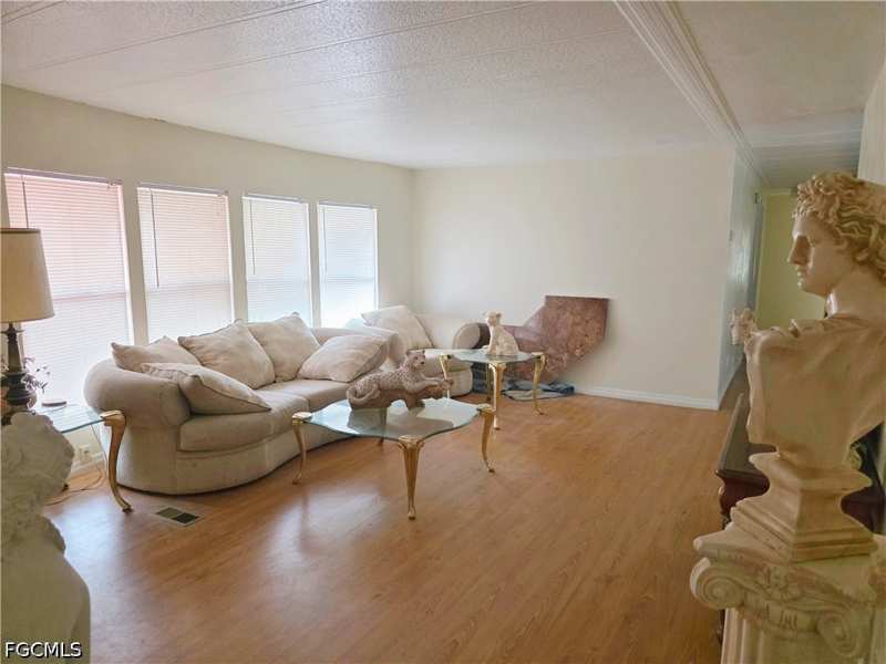 4 bedroom ManufacturedHome at 8290 Nault Rd, Suncoast Estates Unrec, North Fort Myers — photo 1