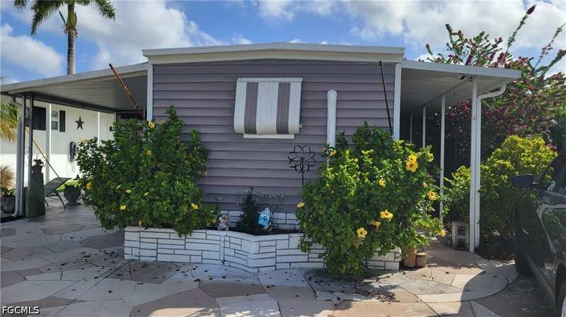 2 bedroom ManufacturedHome at 91 Sun Cir, Orange Harbor Mobile Home Park, Fort Myers — photo 1