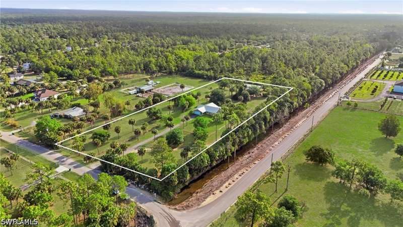 3 bedroom SingleFamilyResidence at 940 10th St SE, Golden Gate Estates, Naples — photo 1