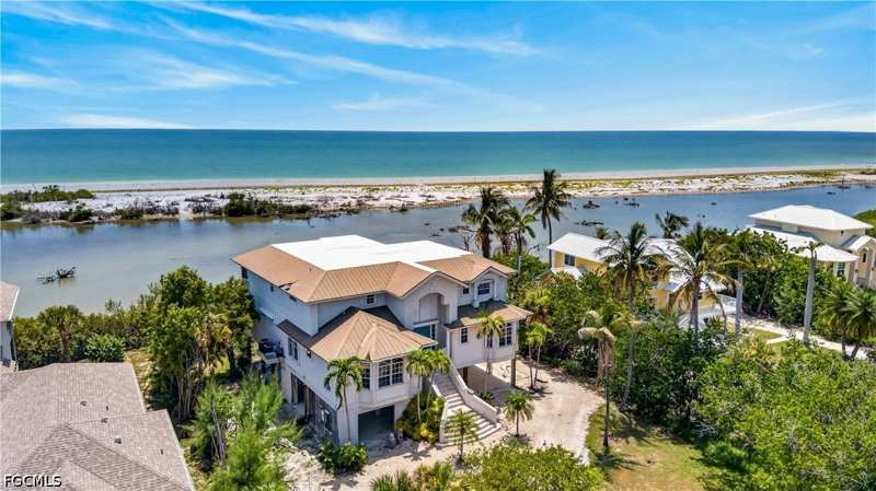 4 bedroom SingleFamilyResidence at 6007 Clam Bayou Ln, White Heron Subdivision, Sanibel — photo 1