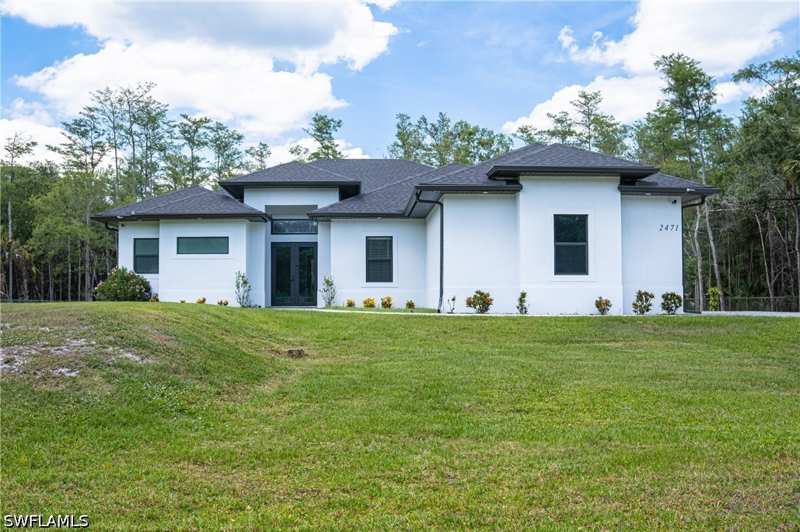 3 bedroom SingleFamilyResidence at 2471 64th Ave NE, Golden Gate Estates, Naples — photo 1