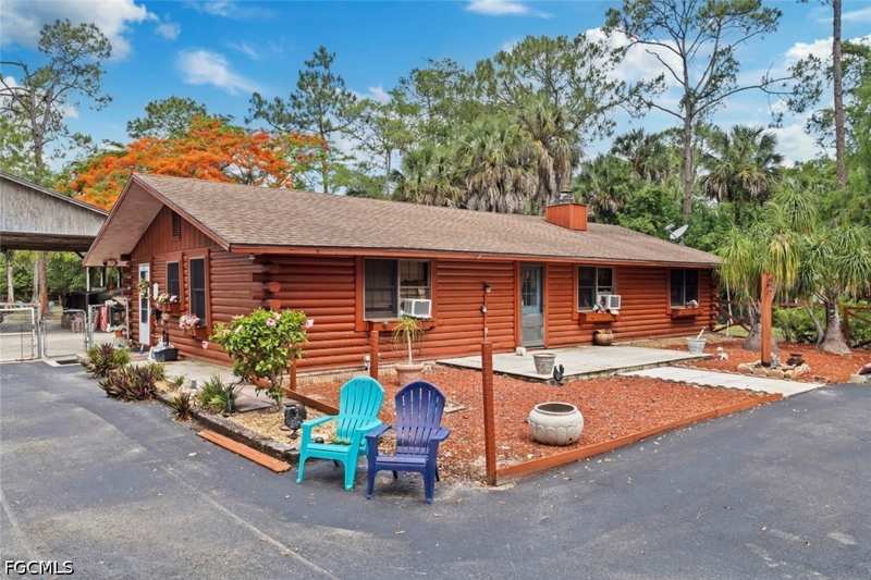 4 bedroom SingleFamilyResidence at 1445 31st St SW, Golden Gate Estates, Naples — photo 1