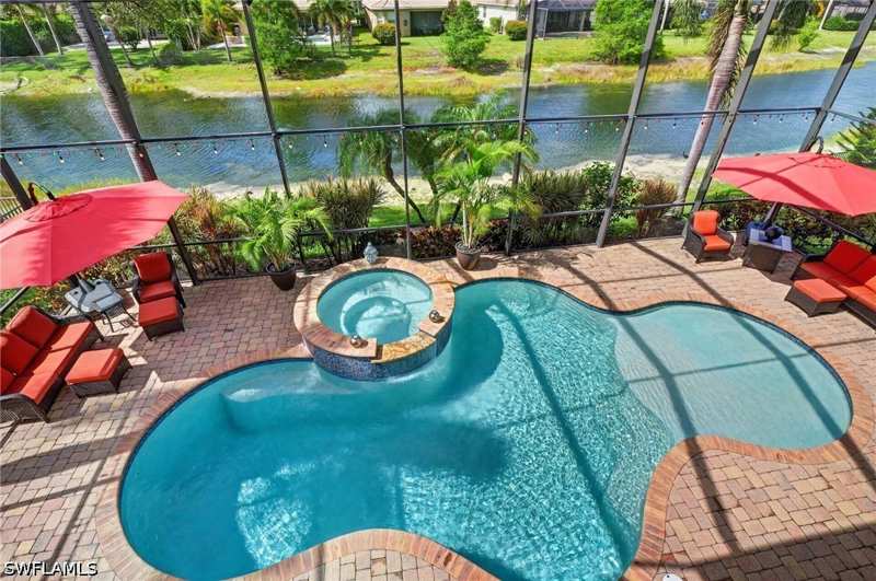 5 bedroom SingleFamilyResidence at 6598 Monterey Pt, Marbella Lakes, Naples — photo 1