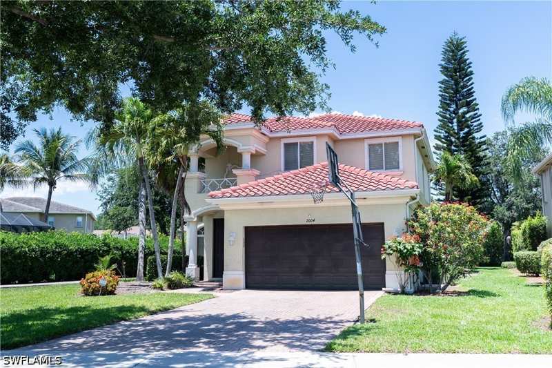 4 bedroom SingleFamilyResidence at 2004 Par Dr, Valencia Country Club, Naples — photo 1