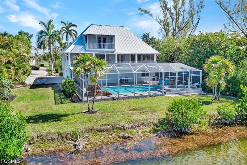 3 bedroom SingleFamilyResidence at 9007 Mockingbird Dr, Dunes At Sanibel Island, Sanibel — photo 1