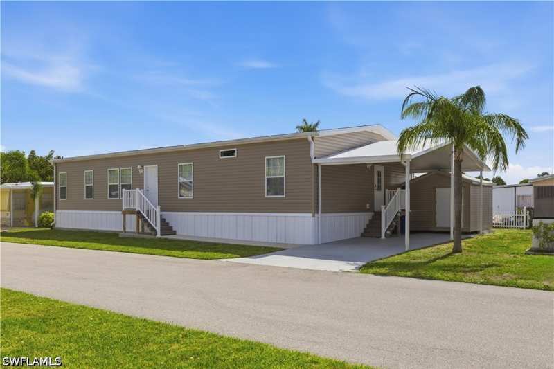 3 bedroom ManufacturedHome at 24 Red Poinciana Dr, Garden Cove, Fort Myers — photo 1