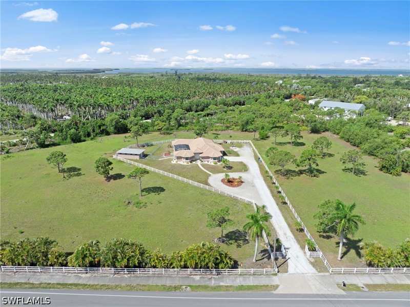 4 bedroom SingleFamilyResidence at 13541 Stringfellow Rd, Kreamers Avocado Subd, Bokeelia — photo 1