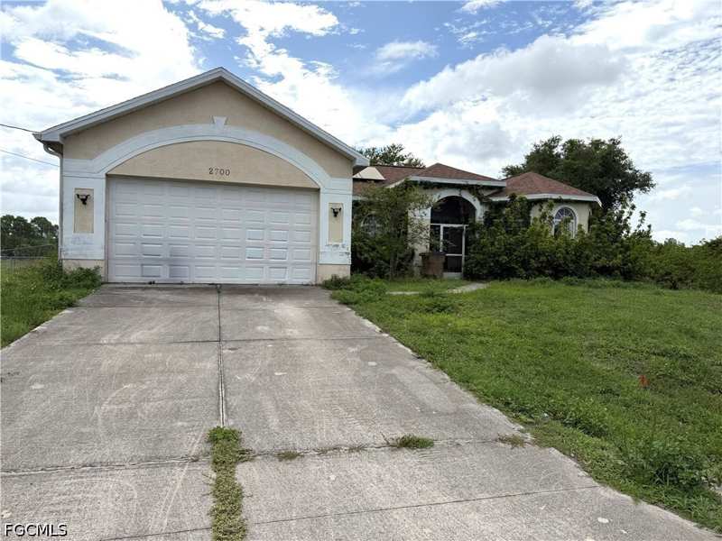 3 bedroom SingleFamilyResidence at 2700 Rita Ave N, Lehigh Park, Lehigh Acres — photo 1