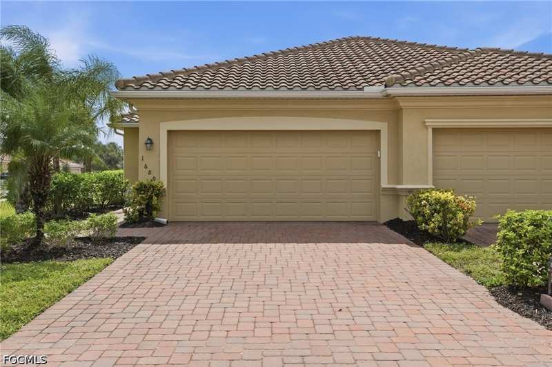 3 bedroom Attached at 1689 Alameda Dr, Orange Blossom Ranch, Naples — photo 1