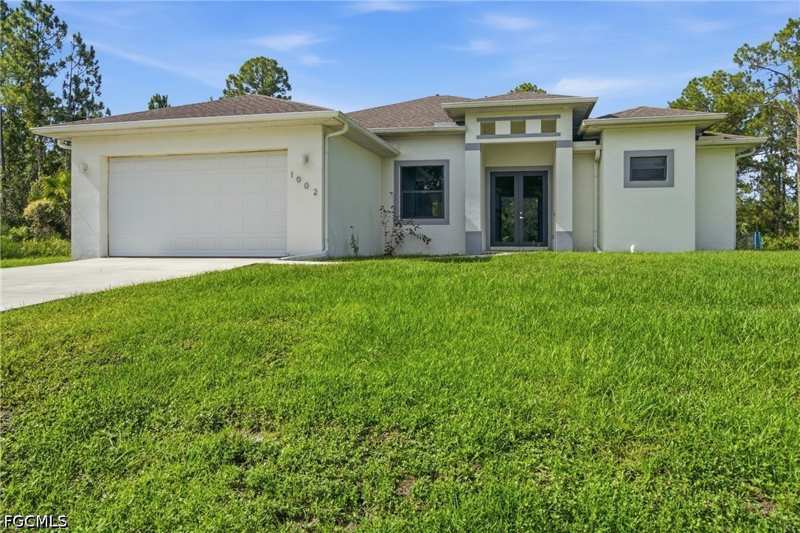 3 bedroom SingleFamilyResidence at 1002 E 5th St, Lehigh Estates, Lehigh Acres — photo 1