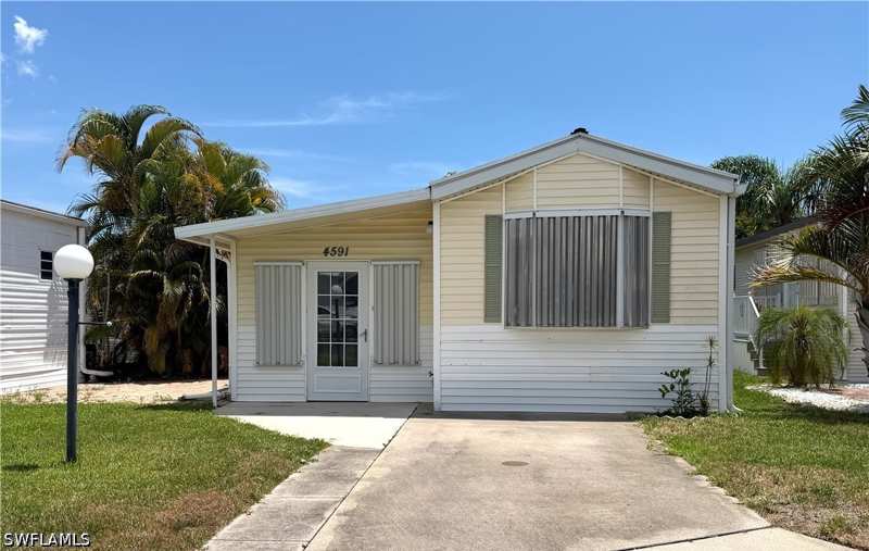 1 bedroom ManufacturedHome at 4591 Candlestick Ct E, Riverwoods Plantation, Estero — photo 1