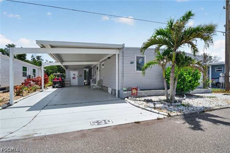 2 bedroom ManufacturedHome at 14633 Paul Revere Loop, Old Bridge Village, North Fort Myers — photo 1