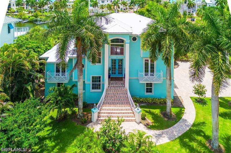4 bedroom SingleFamilyResidence at 98 Southport Cv, Southport On The Bay, Bonita Springs — photo 1