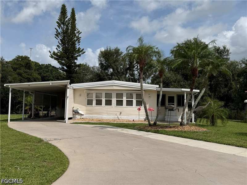 2 bedroom ManufacturedHome at 250 Santa Fe Trl, Carriage Village, North Fort Myers — photo 1