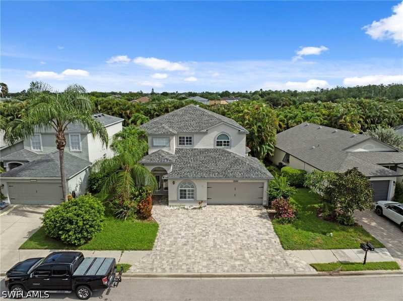 4 bedroom SingleFamilyResidence at 21684 Brixham Run Loop, Stoneybrook, Estero — photo 1