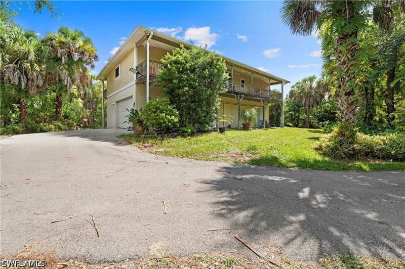 3 bedroom SingleFamilyResidence at 875 20th St NE, Golden Gate Estates, Naples — photo 1