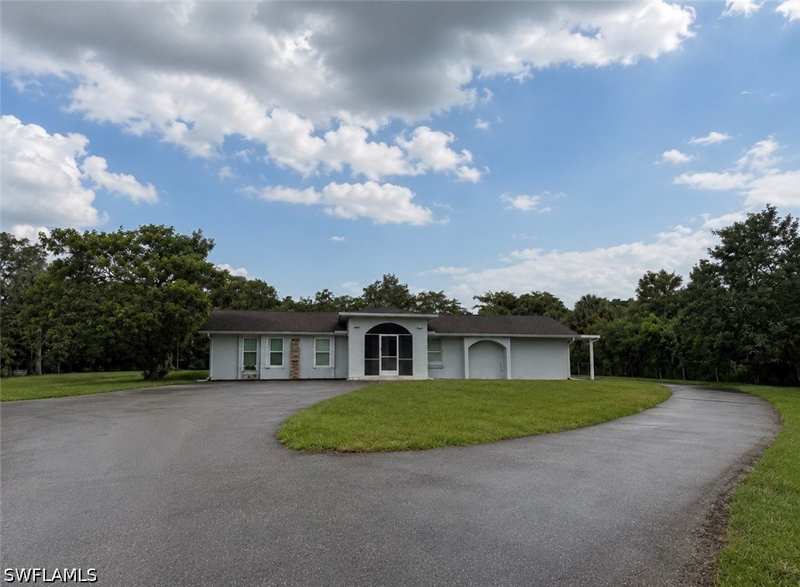 5 bedroom SingleFamilyResidence at 565 6th St SE, Golden Gate Estates, Naples — photo 1