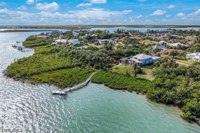 4 bedroom SingleFamilyResidence at 831 Caxambas Dr, Estates, Marco Island — photo 1