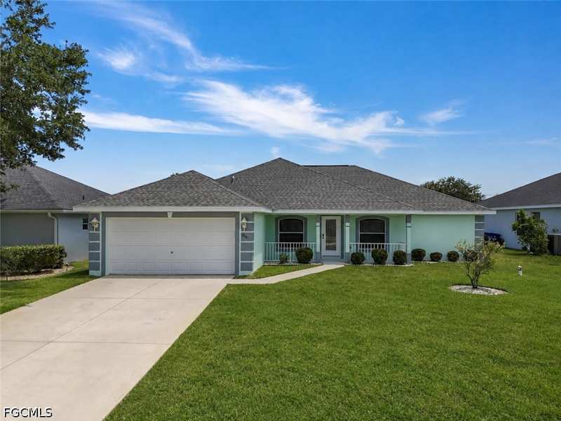 3 bedroom SingleFamilyResidence at 8141 Liriope Loop, Town Lakes, Lehigh Acres — photo 1