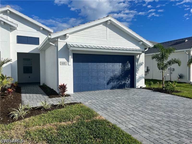 2 bedroom Attached at 9195 Cayman Dr, Azure At Hacienda Lakes, Naples — photo 1