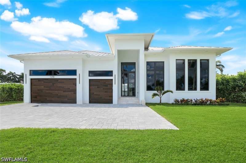 4 bedroom SingleFamilyResidence at 1248 13th Ave N, Lake Park, Naples — photo 1