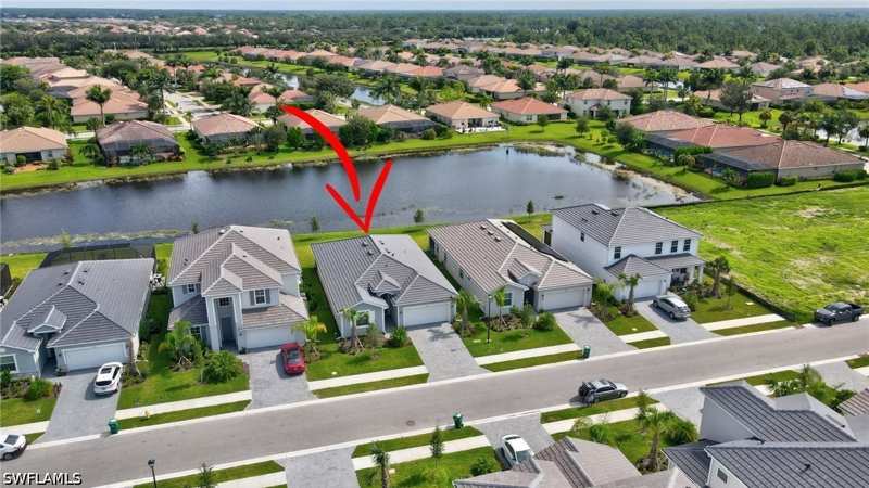 4 bedroom SingleFamilyResidence at 2301 Avocado Ln, The Groves At Orange Blossom Ranch, Naples — photo 1