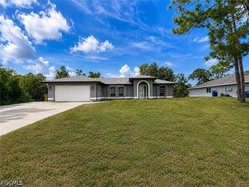 3 bedroom SingleFamilyResidence at 2411 Millie Ave S, Lehigh Estates, Lehigh Acres — photo 1