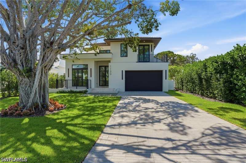 4 bedroom SingleFamilyResidence at 1150 8th Ter N, Lake Park, Naples — photo 1