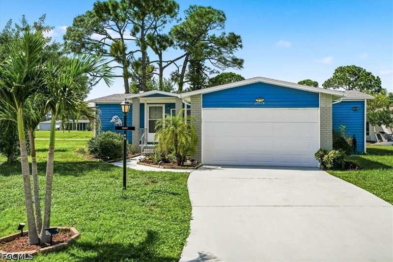 2 bedroom ManufacturedHome at 10074 Broken Woods Ct, Pine Lakes Country Club, North Fort Myers — photo 1