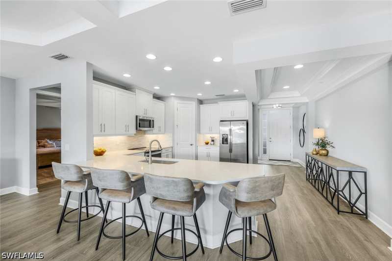 2 bedroom Condominium at 9641 Montelanico Loop 103, Esplanade, Naples — photo 1
