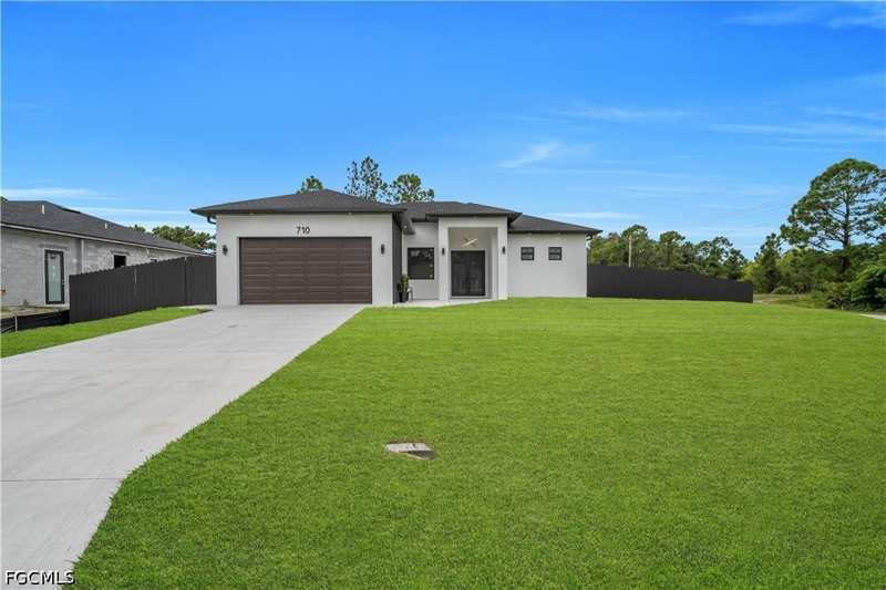 3 bedroom SingleFamilyResidence at 710 E Almelia St, Lehigh Acres, Lehigh Acres — photo 1