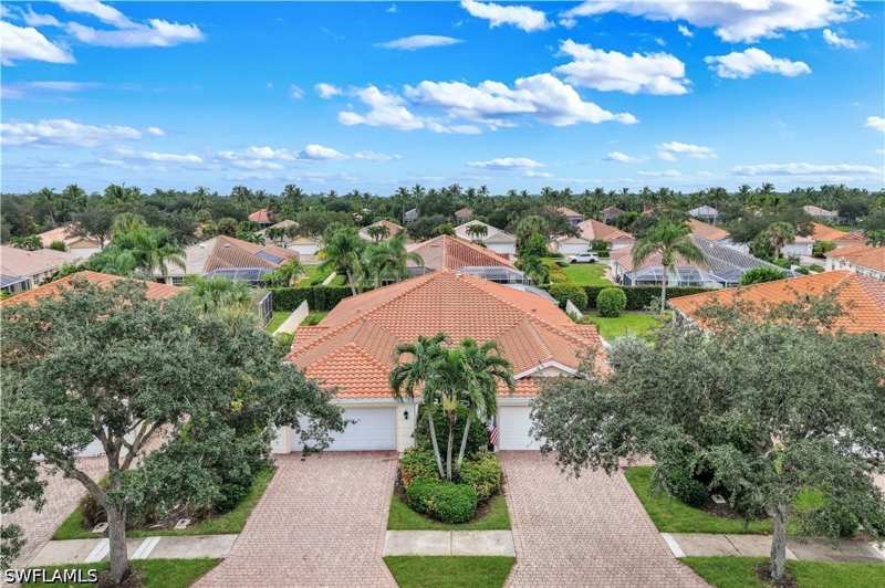 2 bedroom Attached at 4892 Lasqueti Way, Island Walk, Naples — photo 1