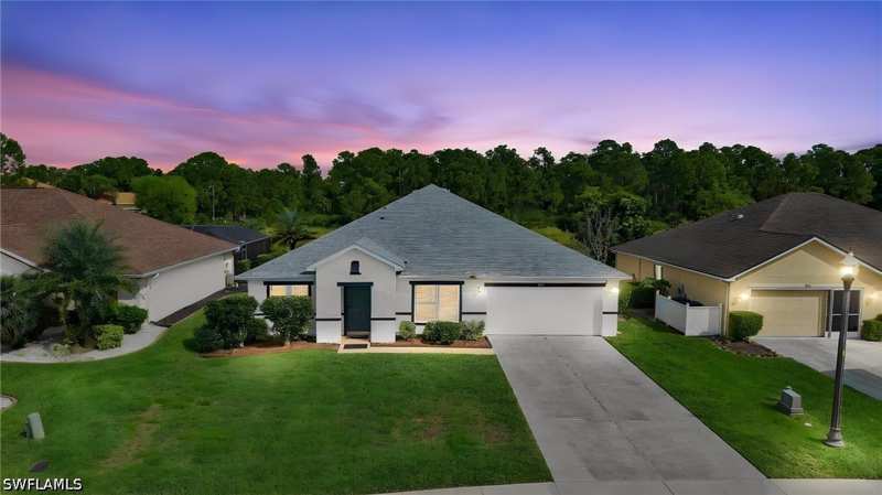 4 bedroom SingleFamilyResidence at 8031 Liriope Loop, Town Lakes, Lehigh Acres — photo 1