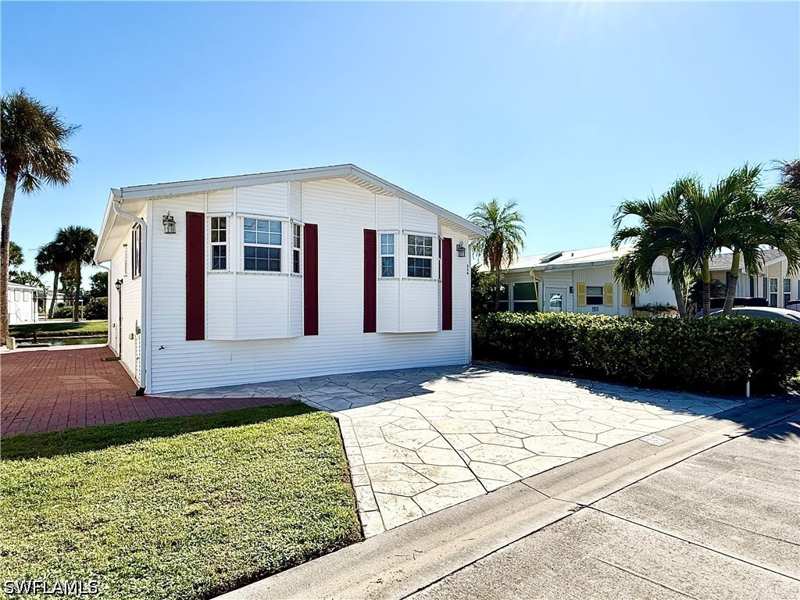2 bedroom ManufacturedHome at 554 Cattleya Refuge 554, Imperial Wilderness, Naples — photo 1