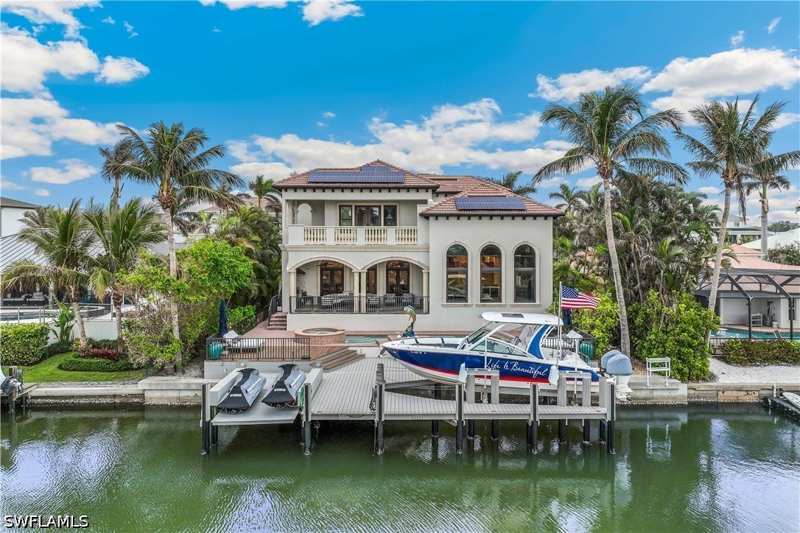 4 bedroom SingleFamilyResidence at 280 Egret Ave, Conners, Naples — photo 1