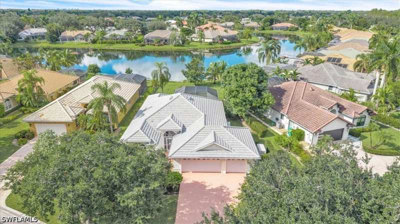 3 bedroom SingleFamilyResidence at 4407 Pomarine Ct, Longshore Lake, Naples — photo 1