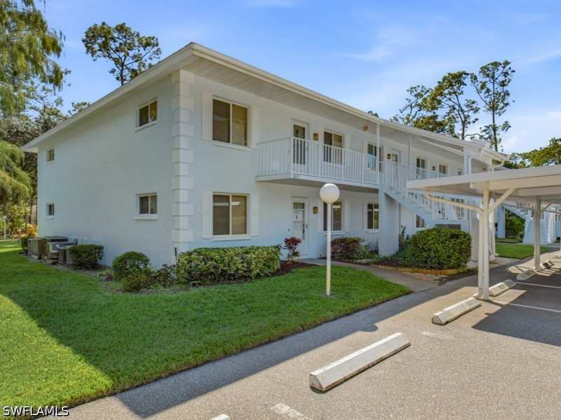 2 bedroom Condominium at 3471 County Barn Rd F-104, Woodmere Racquet Club, Naples — photo 1
