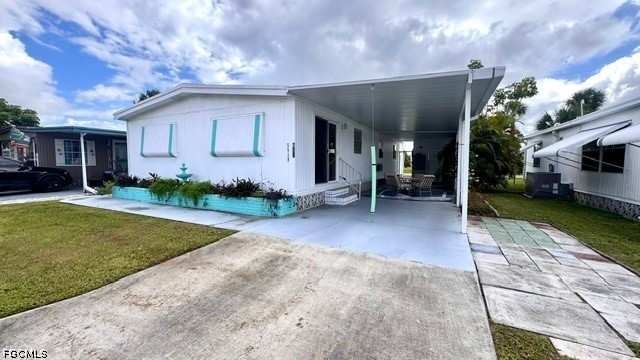 2 bedroom ManufacturedHome at 5518 Virginia Dare Ln, Old Bridge Village, North Fort Myers — photo 1